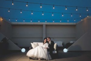 A Night Shot of Dolce Rooftop Showing a Couple Celebrating Their Wedding